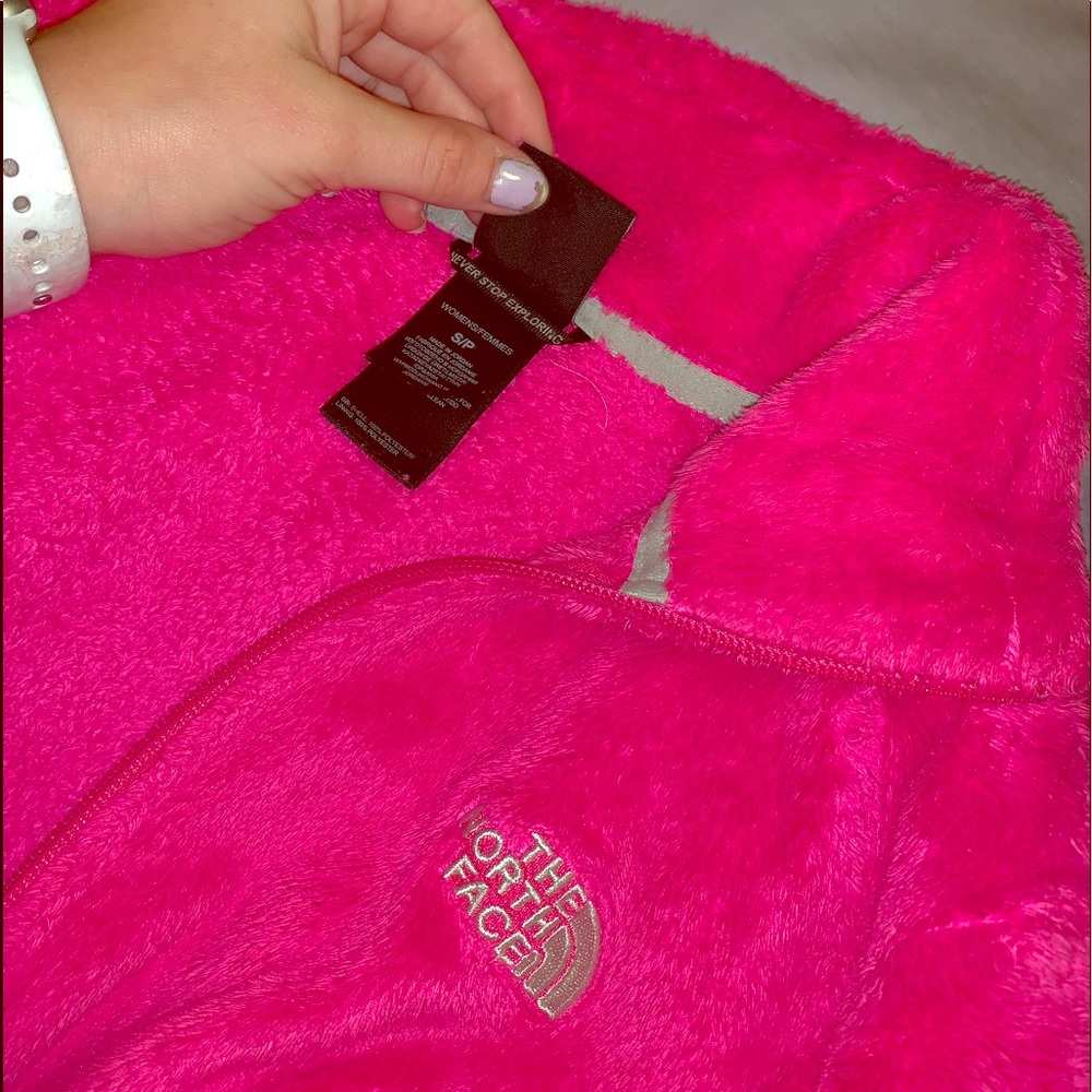 bright pink north face jacket